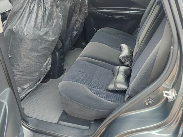 Сірий Хендай Туксон, об'ємом двигуна 2 л та пробігом 95 тис. км за 8800 $, фото 10 на Automoto.ua