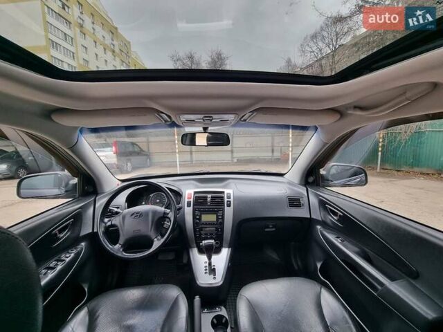 Серый Хендай Туксон, объемом двигателя 1.98 л и пробегом 262 тыс. км за 7999 $, фото 10 на Automoto.ua
