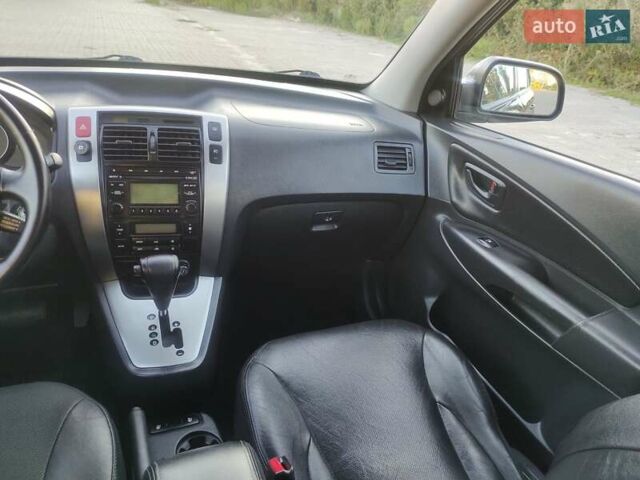 Сірий Хендай Туксон, об'ємом двигуна 2 л та пробігом 234 тис. км за 8750 $, фото 39 на Automoto.ua