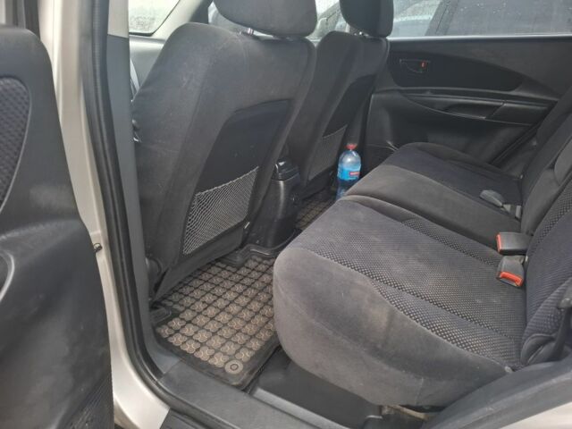 Серый Хендай Туксон, объемом двигателя 2 л и пробегом 136 тыс. км за 8999 $, фото 5 на Automoto.ua