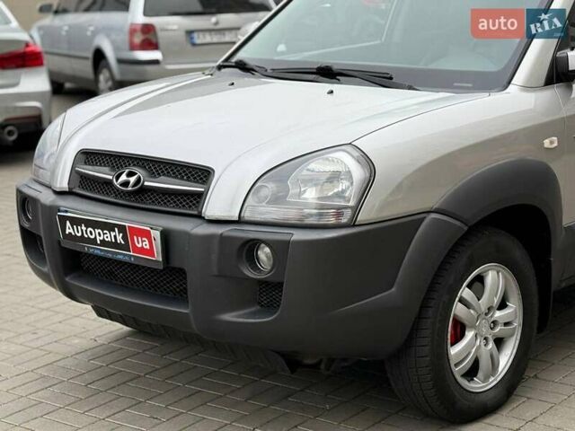 Серый Хендай Туксон, объемом двигателя 2.7 л и пробегом 210 тыс. км за 9290 $, фото 7 на Automoto.ua