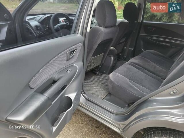 Серый Хендай Туксон, объемом двигателя 1.99 л и пробегом 302 тыс. км за 9300 $, фото 19 на Automoto.ua