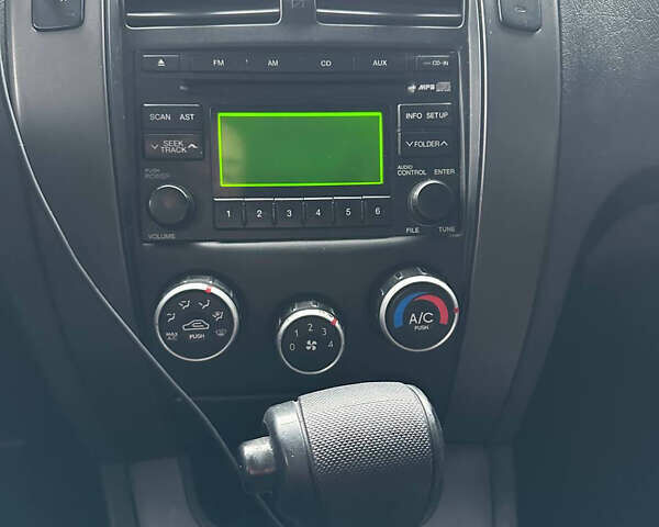 Серый Хендай Туксон, объемом двигателя 1.98 л и пробегом 227 тыс. км за 7700 $, фото 15 на Automoto.ua