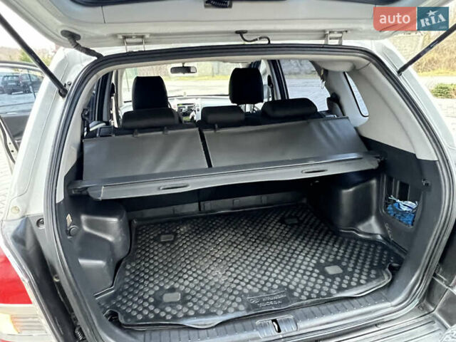 Серый Хендай Туксон, объемом двигателя 2 л и пробегом 176 тыс. км за 8300 $, фото 34 на Automoto.ua