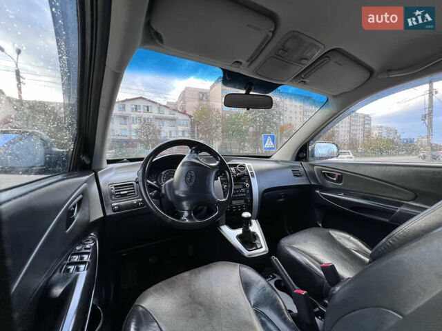Серый Хендай Туксон, объемом двигателя 2 л и пробегом 210 тыс. км за 7700 $, фото 15 на Automoto.ua