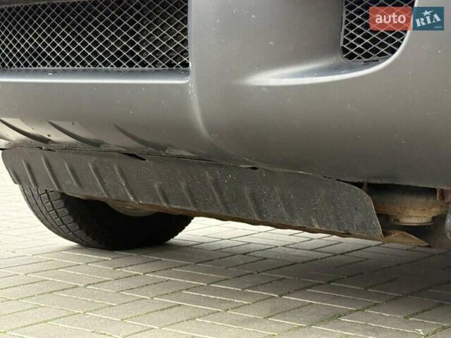 Серый Хендай Туксон, объемом двигателя 2.7 л и пробегом 210 тыс. км за 9290 $, фото 8 на Automoto.ua