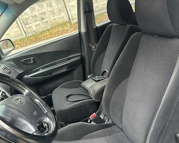 Сірий Хендай Туксон, об'ємом двигуна 1.99 л та пробігом 221 тис. км за 6000 $, фото 12 на Automoto.ua