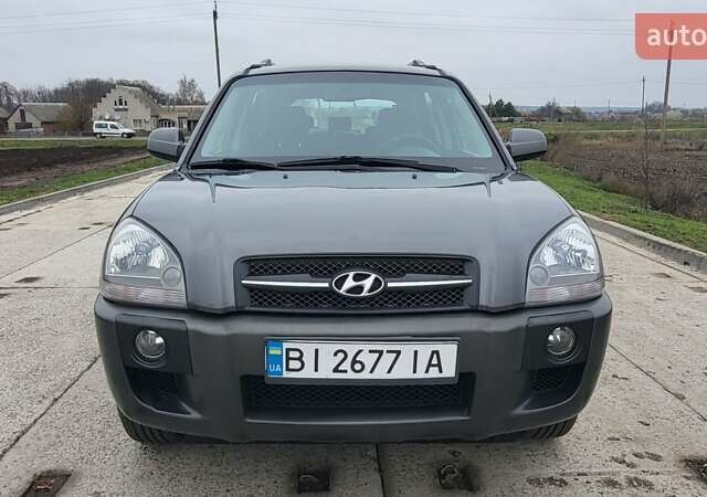 Серый Хендай Туксон, объемом двигателя 1.98 л и пробегом 177 тыс. км за 8200 $, фото 11 на Automoto.ua