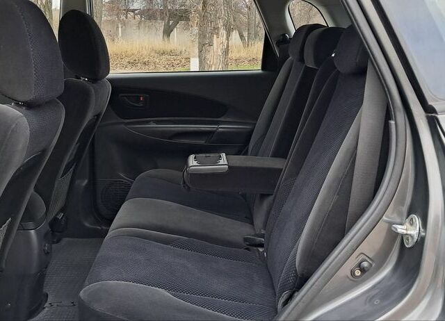 Серый Хендай Туксон, объемом двигателя 2 л и пробегом 95 тыс. км за 8800 $, фото 14 на Automoto.ua