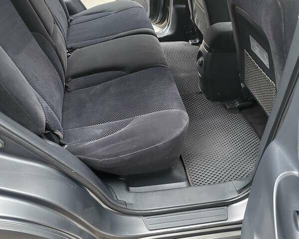 Серый Хендай Туксон, объемом двигателя 1.99 л и пробегом 302 тыс. км за 9300 $, фото 12 на Automoto.ua