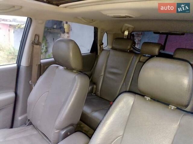 Серый Хендай Туксон, объемом двигателя 1.98 л и пробегом 247 тыс. км за 6200 $, фото 7 на Automoto.ua