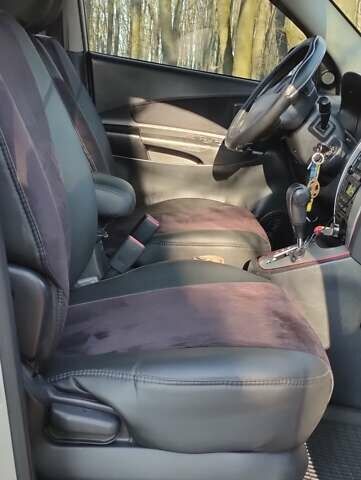 Сірий Хендай Туксон, об'ємом двигуна 1.99 л та пробігом 272 тис. км за 8500 $, фото 12 на Automoto.ua