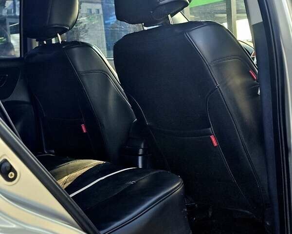 Серый Хендай Туксон, объемом двигателя 1.98 л и пробегом 199 тыс. км за 8350 $, фото 10 на Automoto.ua