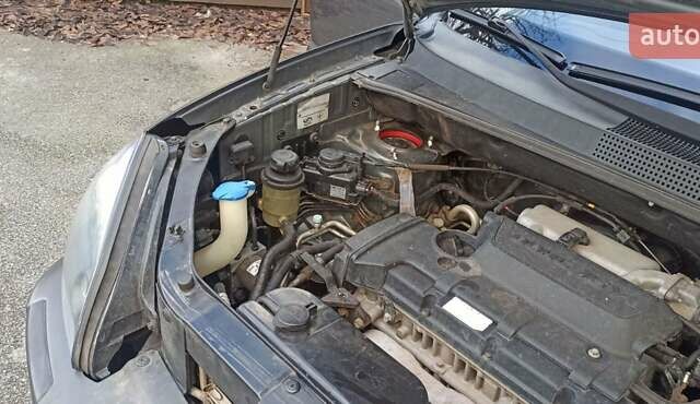 Серый Хендай Туксон, объемом двигателя 1.98 л и пробегом 258 тыс. км за 7500 $, фото 31 на Automoto.ua