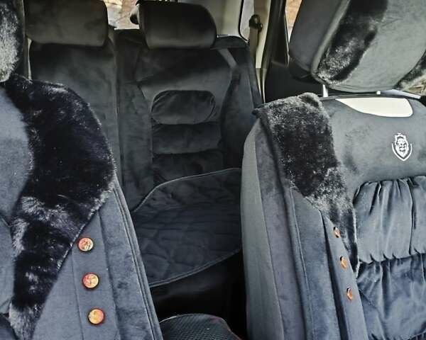 Серый Хендай Туксон, объемом двигателя 2 л и пробегом 197 тыс. км за 8700 $, фото 6 на Automoto.ua