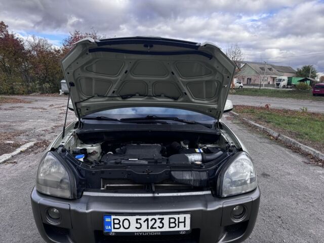 Хендай Туксон 2008 в Жмеренке на Automoto.ua Серый Хендай Туксон, объемом двигателя 2 л и пробегом 228 тыс. км за 6900 $, фото 16 на Automoto.ua