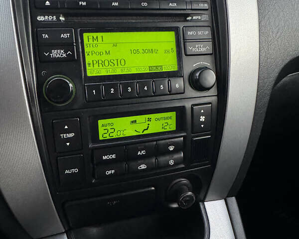 Серый Хендай Туксон, объемом двигателя 1.98 л и пробегом 246 тыс. км за 7500 $, фото 20 на Automoto.ua