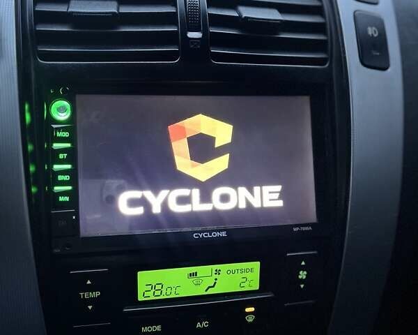 Серый Хендай Туксон, объемом двигателя 1.98 л и пробегом 254 тыс. км за 6900 $, фото 11 на Automoto.ua