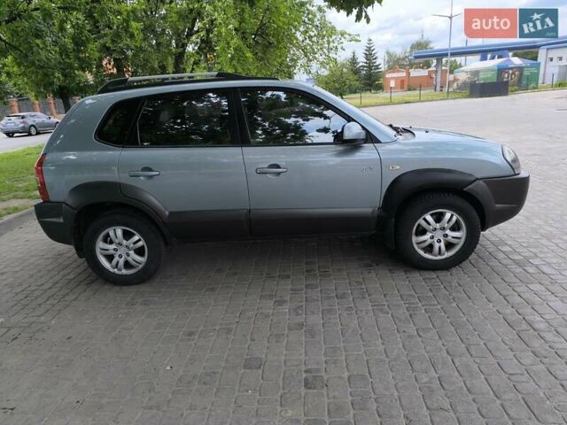 Сірий Хендай Туксон, об'ємом двигуна 1.98 л та пробігом 215 тис. км за 7400 $, фото 7 на Automoto.ua