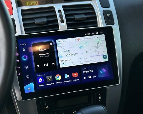 Серый Хендай Туксон, объемом двигателя 1.98 л и пробегом 198 тыс. км за 13000 $, фото 10 на Automoto.ua