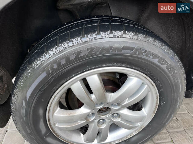 Серый Хендай Туксон, объемом двигателя 2 л и пробегом 198 тыс. км за 8900 $, фото 9 на Automoto.ua