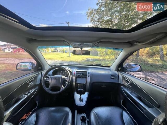 Серый Хендай Туксон, объемом двигателя 1.98 л и пробегом 220 тыс. км за 8500 $, фото 9 на Automoto.ua