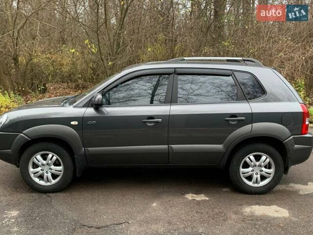 Сірий Хендай Туксон, об'ємом двигуна 1.98 л та пробігом 170 тис. км за 8800 $, фото 3 на Automoto.ua