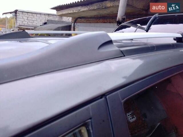 Серый Хендай Туксон, объемом двигателя 1.98 л и пробегом 247 тыс. км за 6200 $, фото 12 на Automoto.ua