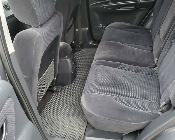 Серый Хендай Туксон, объемом двигателя 1.99 л и пробегом 302 тыс. км за 9300 $, фото 13 на Automoto.ua