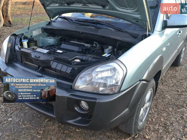 Сірий Хендай Туксон, об'ємом двигуна 2.02 л та пробігом 226 тис. км за 9200 $, фото 18 на Automoto.ua