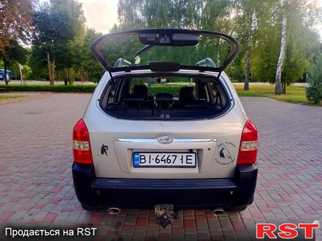 Серый Хендай Туксон, объемом двигателя 2.7 л и пробегом 280 тыс. км за 6500 $, фото 8 на Automoto.ua