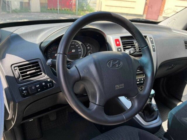 Серый Хендай Туксон, объемом двигателя 2 л и пробегом 265 тыс. км за 7599 $, фото 15 на Automoto.ua