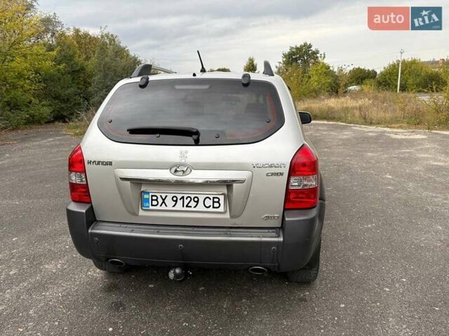 Серый Хендай Туксон, объемом двигателя 1.99 л и пробегом 206 тыс. км за 7700 $, фото 10 на Automoto.ua