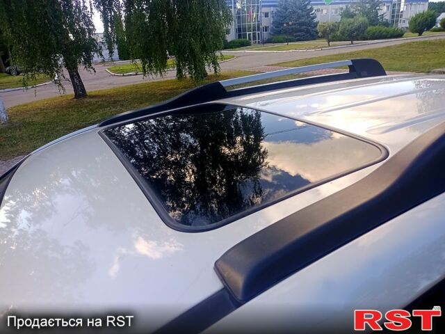 Серый Хендай Туксон, объемом двигателя 2.7 л и пробегом 280 тыс. км за 6500 $, фото 6 на Automoto.ua