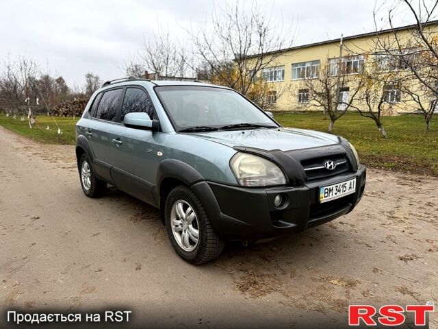 Серый Хендай Туксон, объемом двигателя 2.7 л и пробегом 228 тыс. км за 7650 $, фото 5 на Automoto.ua