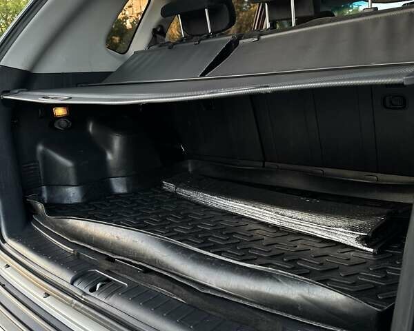 Серый Хендай Туксон, объемом двигателя 1.98 л и пробегом 198 тыс. км за 13000 $, фото 13 на Automoto.ua