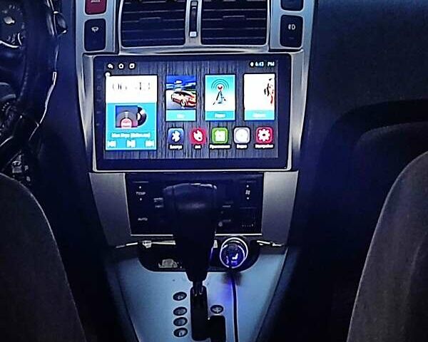 Сірий Хендай Туксон, об'ємом двигуна 1.99 л та пробігом 350 тис. км за 7800 $, фото 2 на Automoto.ua