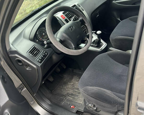 Сірий Хендай Туксон, об'ємом двигуна 1.98 л та пробігом 130 тис. км за 8900 $, фото 8 на Automoto.ua