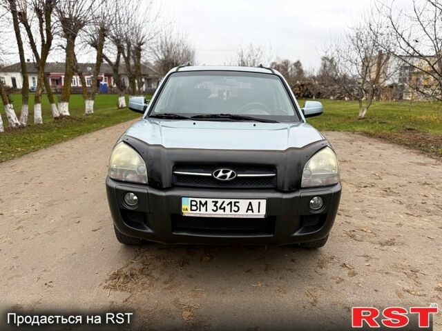 Серый Хендай Туксон, объемом двигателя 2.7 л и пробегом 228 тыс. км за 7650 $, фото 1 на Automoto.ua