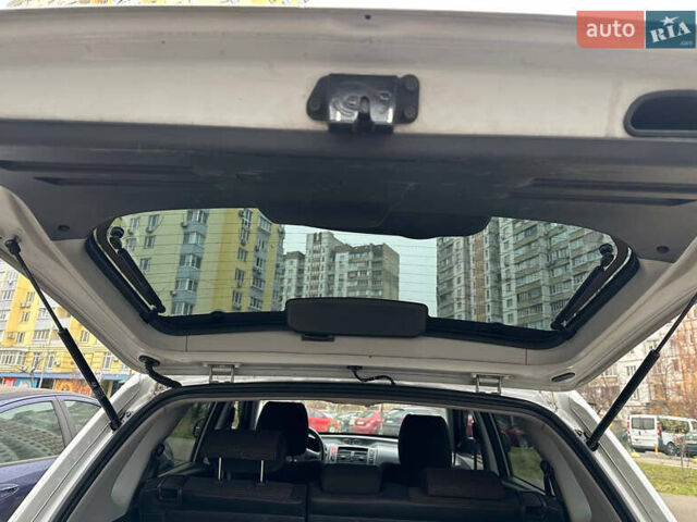 Серый Хендай Туксон, объемом двигателя 1.98 л и пробегом 227 тыс. км за 7700 $, фото 12 на Automoto.ua