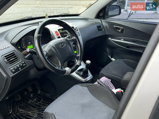 Серый Хендай Туксон, объемом двигателя 2 л и пробегом 176 тыс. км за 8300 $, фото 25 на Automoto.ua