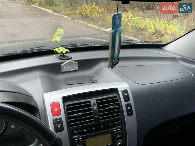 Сірий Хендай Туксон, об'ємом двигуна 1.98 л та пробігом 170 тис. км за 8800 $, фото 24 на Automoto.ua
