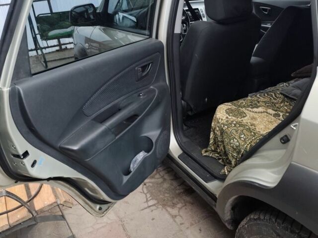 Серый Хендай Туксон, объемом двигателя 2 л и пробегом 190 тыс. км за 9000 $, фото 10 на Automoto.ua