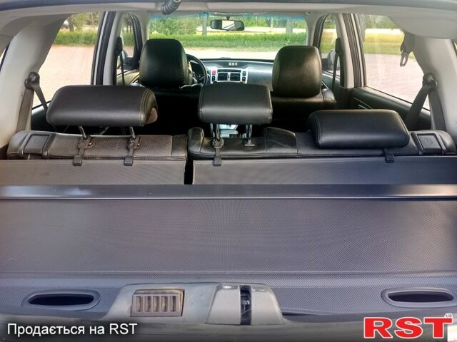 Серый Хендай Туксон, объемом двигателя 2.7 л и пробегом 280 тыс. км за 6500 $, фото 4 на Automoto.ua