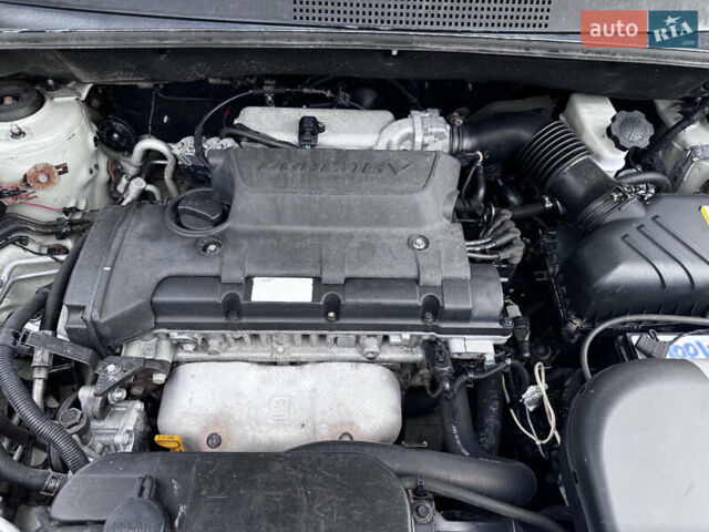 Серый Хендай Туксон, объемом двигателя 2 л и пробегом 228 тыс. км за 6700 $, фото 11 на Automoto.ua