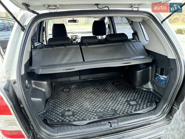 Серый Хендай Туксон, объемом двигателя 2 л и пробегом 176 тыс. км за 8300 $, фото 33 на Automoto.ua