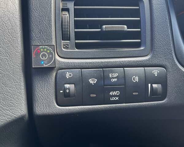 Серый Хендай Туксон, объемом двигателя 1.98 л и пробегом 220 тыс. км за 8500 $, фото 14 на Automoto.ua