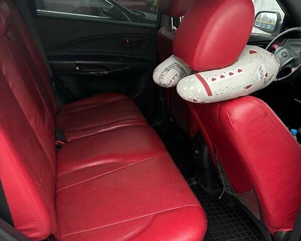 Серый Хендай Туксон, объемом двигателя 2 л и пробегом 330 тыс. км за 6200 $, фото 8 на Automoto.ua