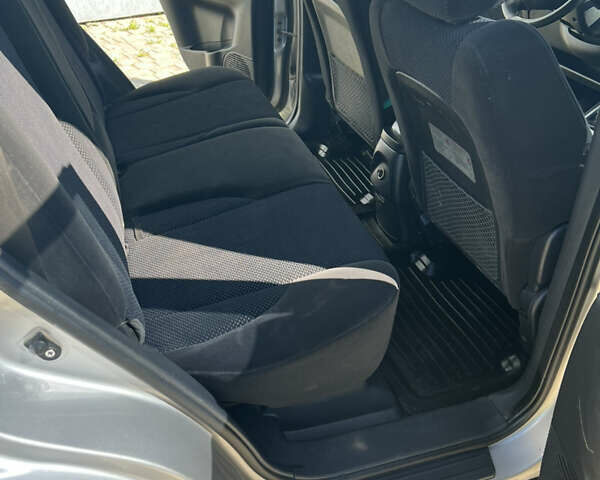 Серый Хендай Туксон, объемом двигателя 1.98 л и пробегом 265 тыс. км за 6900 $, фото 12 на Automoto.ua