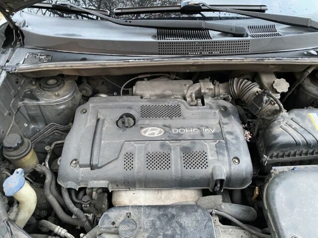 Сірий Хендай Туксон, об'ємом двигуна 2 л та пробігом 170 тис. км за 7600 $, фото 20 на Automoto.ua